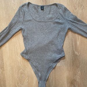 Gray long sleeve body suit. Perfect condition. Size small.